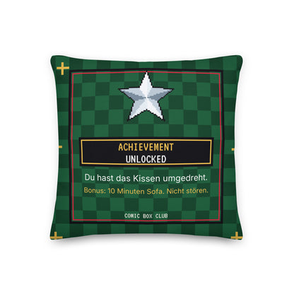 Kissen Level 25 Chrom-Stern, Rückseite: Achievement Unlocked mit dem Spruch Du hast das Kissen umgedreht. Bonus: 10 Minuten Sofa. Nicht stören.