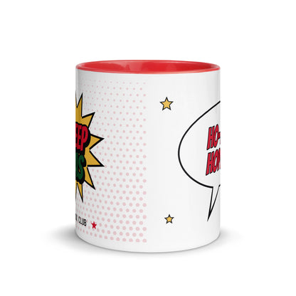 Tasse Creepmas, Seitenansicht: weisse Keramiktasse mit roter Innenseite und Comic-Aufdruck